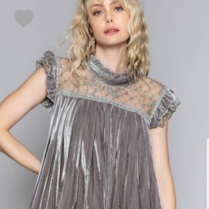 POL Velvet smocked top with ruffle sleeves.